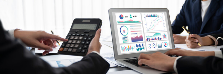 Business intelligence and data analysis concept. Analyst team working on financial data analysis...