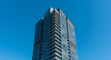 Azure Ascent: Modern Tower Against Vibrant Sky AI Generated