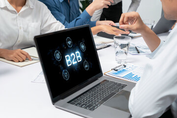 Business person navigates B2B landscape, harness technology to enhance business-to-business...