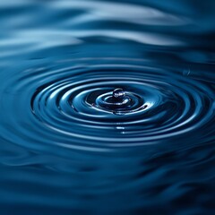 Abstract Raindrop Ripples Abstract raindrop ripples forming geometric patterns monochrome blue aspect ratio minimalist water theme Image