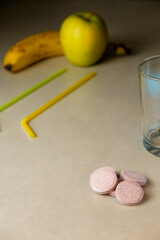 Colorful fruit and candy arrangement on a kitchen counter during afternoon