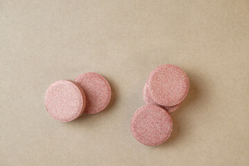 Soft pastel circles scattered across a muted background in an artistic layout