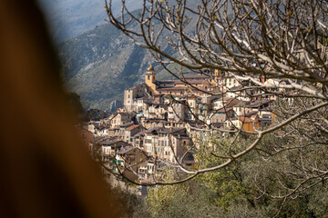 Mountain Village Serenity: Stunning View of Saorge Nestled in the Hills of Southern France Under a Clear Blue Sky
