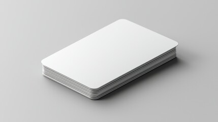 Blank cards stack.  A stack of rectangular, blank cards,  resting on a neutral background.  The cards are uniform in size and color
