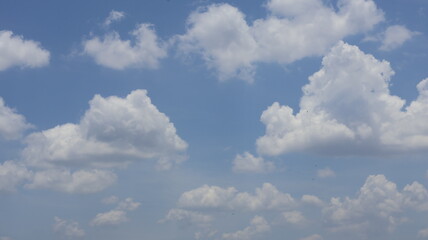 Azure Blue Sky with Soft White Clouds