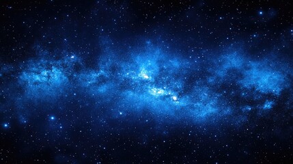 Obraz premium A deep blue cosmic nebula with many stars spread across space and light