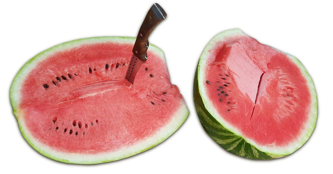 Fresh ripe watermelon cut in half with knife stuck in the flesh on white, isolated elements