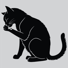 A  cat grooming itself  image silhouette vector art and illustration