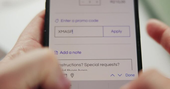 Hands, phone screen and online shopping with promo code for discount, deal or xmas with e commerce. Person, smartphone and mobile app for information, password and user experience with Christmas sale