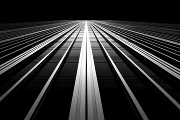 High rise building windows with silver metal framing on a black background, creating a captivating contrast of light and shadow in architectural detail.