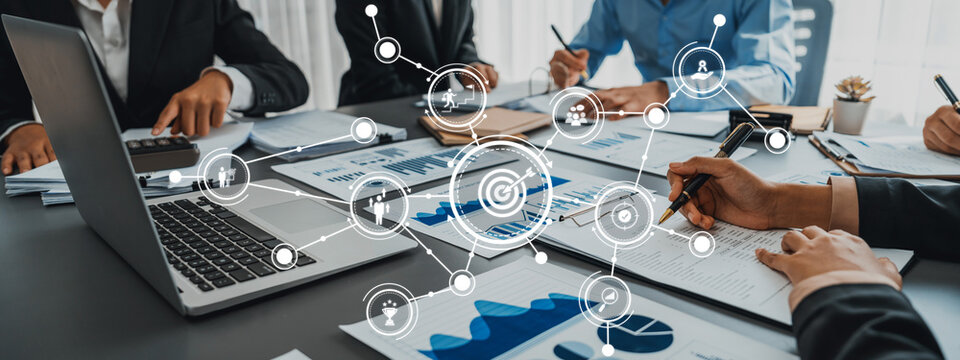 Business intelligence and data analysis concept. Team of analyst working on financial data analysis dashboard on paper as marketing indication for business strategic planning. Insight Amity