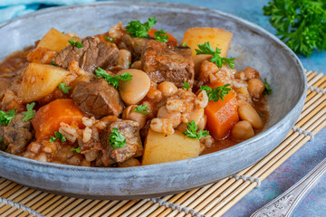 Cholent - traditional slow cooked Jewish stew of beef brisket, butter beans, chickpeas, pearl barley and root vegetables