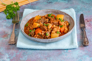 Cholent - traditional slow cooked Jewish stew of beef brisket; butter beans; chickpeas; pearl barley and root vegetables