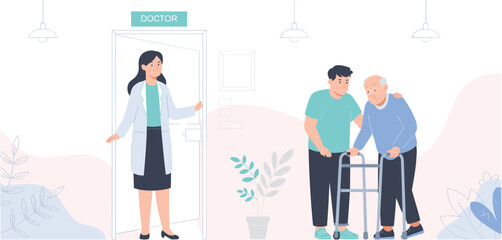 Doctor welcoming an elderly patient with a walker and his son into the office
