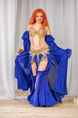 Portrait of a red-haired woman in dance costume