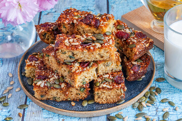 Healthy home baked rolled oats, pumpkin and sunflower seeds breakfast cakes