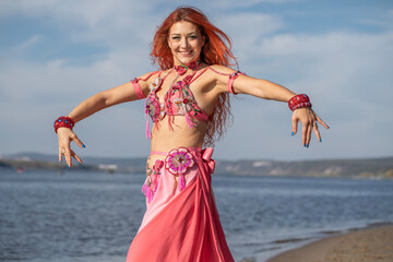 Portrait of a red-haired woman in dance costume