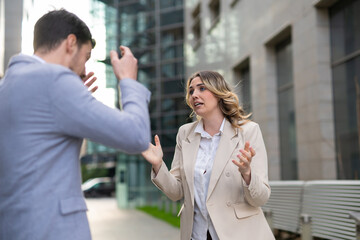 Business people are arguing in the street