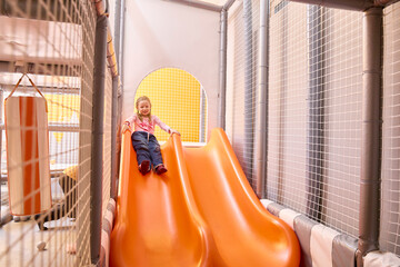 Bright and playful, this image showcases a child s excitement in a safe, stimulating environment,...