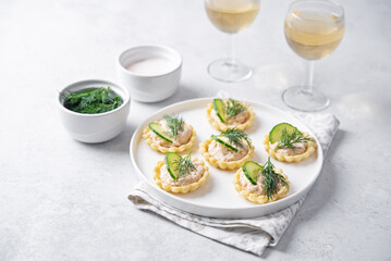 Salmon mousse tartlets in a plate