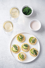 Salmon mousse tartlets in a plate