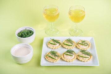Salmon mousse tartlets in a plate