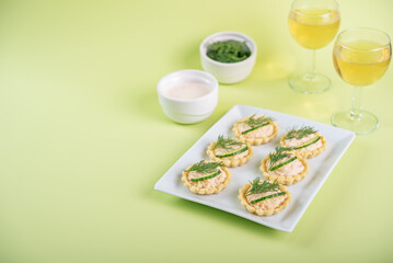 Salmon mousse tartlets in a plate