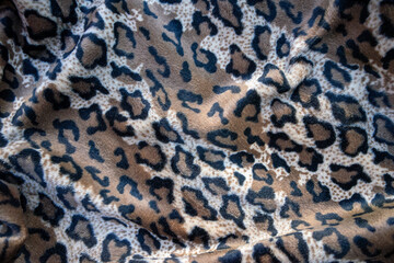 Leopard skin fabric. Silk with leopard print.