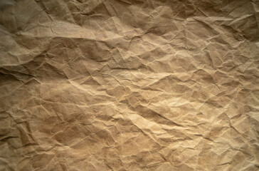 The texture of crumpled photoshop paper. A photograph of old yellowed paper.