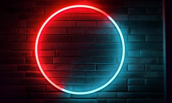 Colorful neon circle against a dark brick wall at night