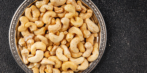 Cashew nuts natural superfood natural food dish organic product fresh tasty gourmet food background...