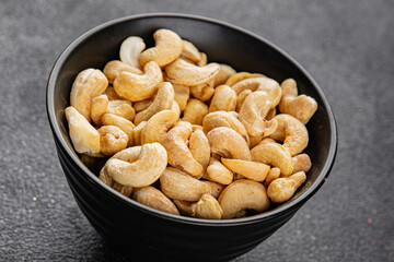 Cashew nuts natural superfood natural food dish organic product fresh tasty gourmet food background on the table rustic food top view copy space keto and paleo diet vegetarian vegan food