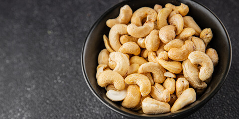 Cashew nuts natural superfood natural food dish organic product fresh tasty gourmet food background on the table rustic food top view copy space keto and paleo diet vegetarian vegan food
