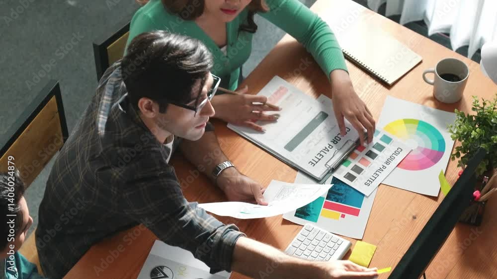 Poster top view of manager writing idea while team standing and giving comment. professional designer desig