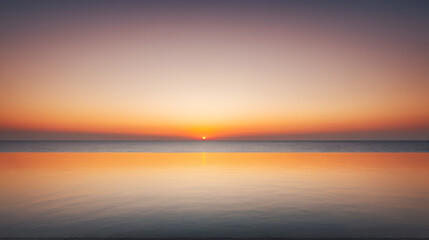 Obraz premium Minimal sunrise, horizon line, wide angle, warm hues for a peaceful background