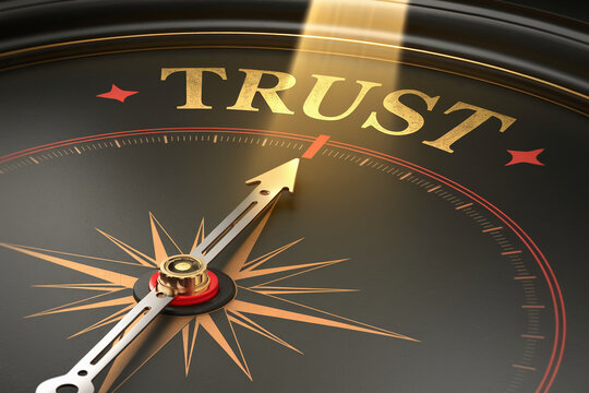 Close-up of compass needle pointing to "TRUST" in gold lettering on dark background, symbolizing direction, guidance, and reliability in business