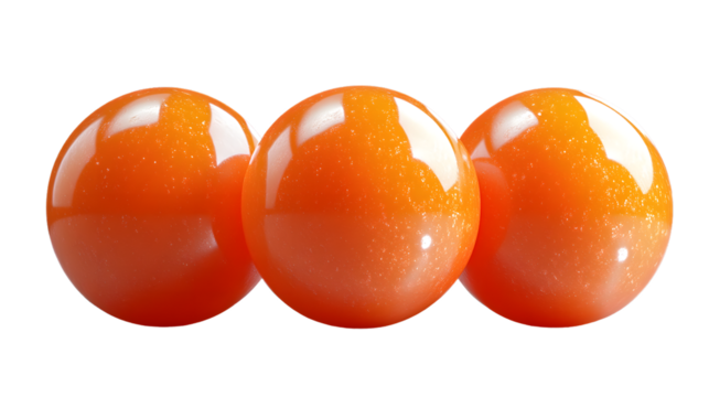 Three Shiny Orange Spheres with Reflective Highlights on a Black Background for Design Art an
