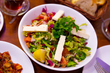 Turkish choban salad with feta cheese and cherry tomatoes
