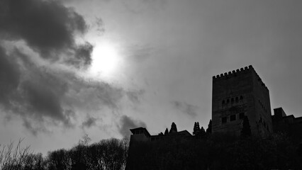 Silhouette of the Comares Tower, the largest in the Alhambra (Granada, Spain), in black and white