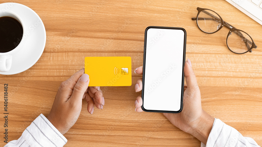 Poster easy pay. above view of woman using credit card and blank smart phone with white mock up, wooden tab
