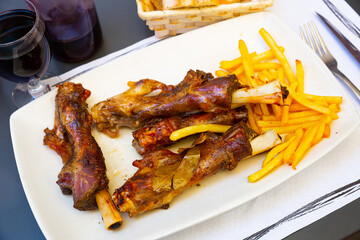 Lamb on the bone with potatoes. Spanish dish