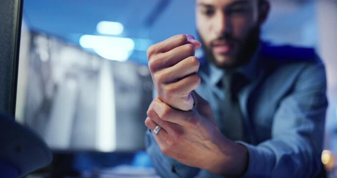 Hands, wrist pain and computer with screen in office for surveillance, stress and fatigue for security company. Person, sore joint and monitor with arthritis, carpal tunnel or injury at data center