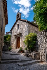 Fototapeta premium A charming little church located in an ancient French town, full of allure and personality.