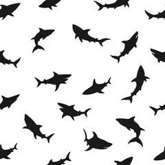 Fototapeta premium Seamless pattern featuring black shark silhouettes in dynamic poses