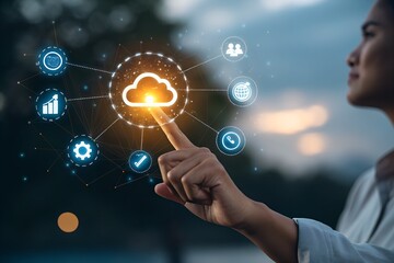 Cloud Connection: A woman points at a digital cloud, surrounded by interconnected icons, representing technology and the seamless exchange of data.