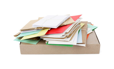 Stack of different paper envelopes and parcel on white background. Post office