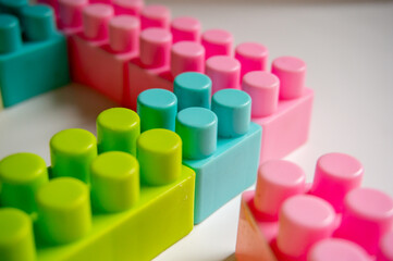 Plastic brick toys that are rarely used on a white background