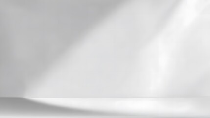 Minimalist abstract white background with soft light and shadow effects in empty studio space, ideal for product display, branding mockup, banner design, or presentation layout