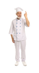 Professional pastry chef pointing at something on white background