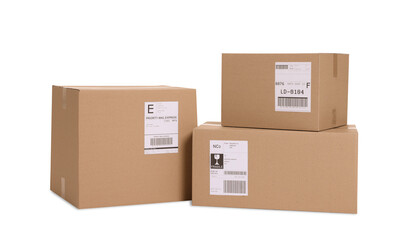 Many parcels with shipment labels isolated on white